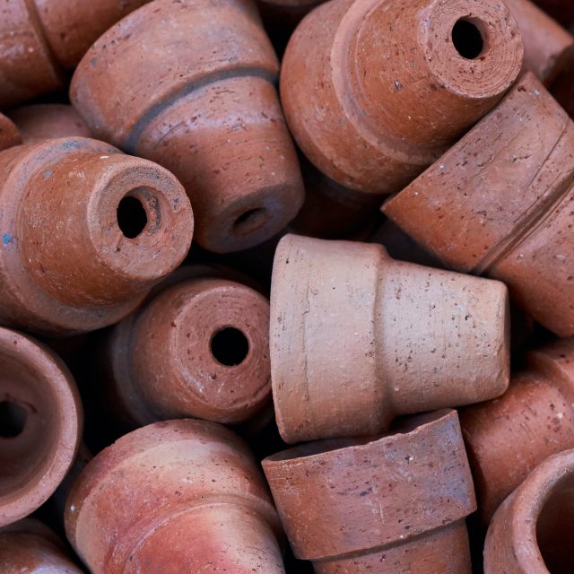 Background of brows clay pots in gardening shop